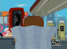 a cartoon character holding a map in front of a phone booth