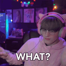 a person wearing headphones and glasses says what while holding a controller