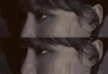 a black and white photo of a woman 's face with a watermark that says ' a ' on it