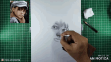 a drawing of a girl 's face is being made in animatica
