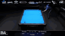 a pool table with a blue cloth that says diamond
