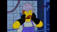 a cartoon character from the simpsons is wearing a hard hat and overalls .