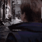 a man looking down a street with the words bye bye