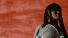 two girls are standing next to each other with one wearing a shirt that says " tokyo "