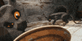 two cartoon cats are standing next to each other and looking at something