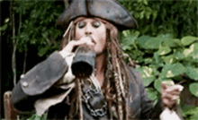 Jack Sparrow Drink Up GIF - Jack Sparrow Drink Up Here You Go GIFs