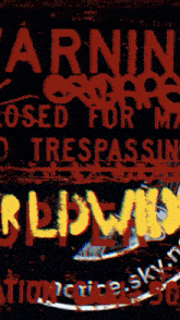 a sign that says " warning closed for my trespassing " on it