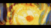 a colorful painting with a yellow circle and a red center