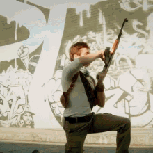 Shooting Nathan Drake GIF - Shooting Nathan Drake Ak47 GIFs