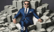 a man in a suit is sitting on a pile of money .