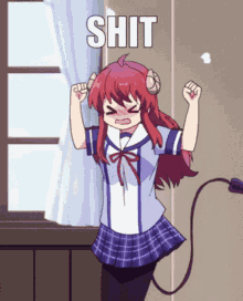a girl with horns is standing in front of a window with the word shit written on it