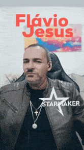 a man wearing a leather jacket and a starmaker necklace
