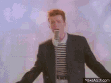 Rick Astley Never Gonna Give You Up GIF - Rick Astley Never Gonna Give You Up Singer GIFs