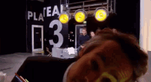 a blurred image of people standing in front of a sign that says platea 03