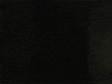 a close up of a black background with a grainy texture