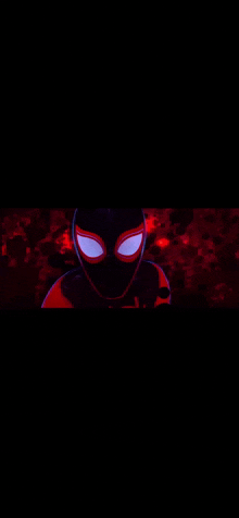 a close up of a person 's face with glowing eyes in the dark