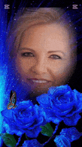 a picture of a woman surrounded by blue roses