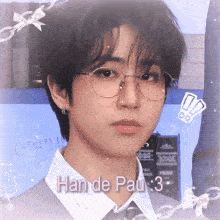 a close up of a person wearing glasses with han de pau 3 written on the bottom
