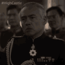 a man in a military uniform with the hashtag #highcastle on the bottom right