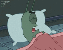 a cartoon character from spongebob squarepants is laying in bed with a pillow .