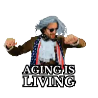 a man in a suit and scarf is dancing with the words aging is living below him