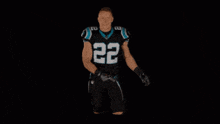 a football player with the number 27 on his jersey is dancing