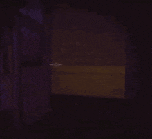 a cartoon baby in a diaper is holding a spoon in his hand in the dark .