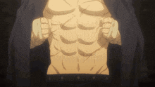 a close up of a man 's torso showing his muscles and a black shirt