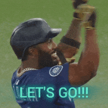 a baseball player with the word let 's go written on his back