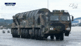 a large military vehicle with the number 625 on the front
