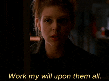 a close up of a woman with the words work my will upon them all