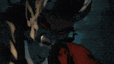a cartoon drawing of a demon with red eyes and fangs