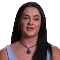 a woman wearing a blue tank top and a necklace with a wooden ball on it