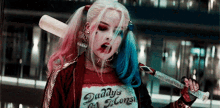 Harley Quinn Pose GIF - Harley Quinn Pose Blow Hair GIFs