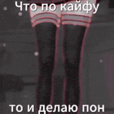 a girl in a red sweater is holding a sword and hearts are surrounding her