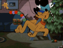 Mickey Loves Decorations GIF - Merry Christmas Mickey Mouse Pluto GIFs