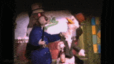 a cartoon dog and duck are on a stage with mousesteps.com in the corner