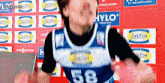 a man with the number 58 on his jersey