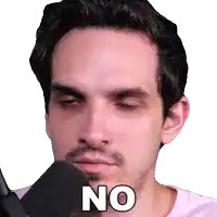 a man with a beard is holding a microphone and says no