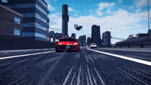 a red car with a license plate that says ' nn ' on it driving down a highway