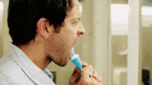 Castiel Misha Collins GIF - Castiel Misha Collins Toothpaste GIFs