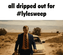 a man in a suit and tie standing next to a car with the words " all dripped out for #lylesweep " below him