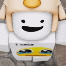 a close up of a cartoon character wearing a hat and a smiley face .