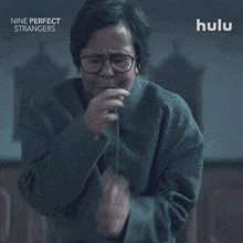 a hulu ad for nine perfect strangers features a man praying