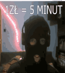 a picture of a person wearing headphones and a mask that says 1zl = 5 minut on it