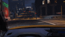 a video game scene with a vinewood plaza sign