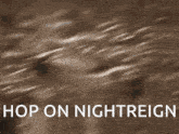 a blurred image of a stadium with the words hop on nightreign below it