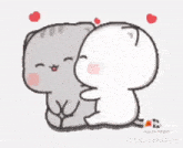 a couple of cartoon cats are hugging each other .