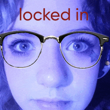 a close up of a woman 's face with the words " locked in " above her