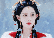 a woman in a red and white costume with a crown on her head looks at the camera